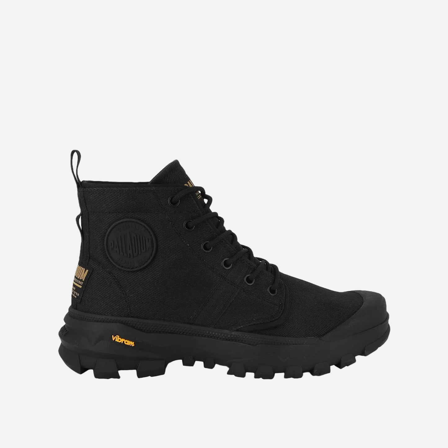 Black boot with visible branding on a white background